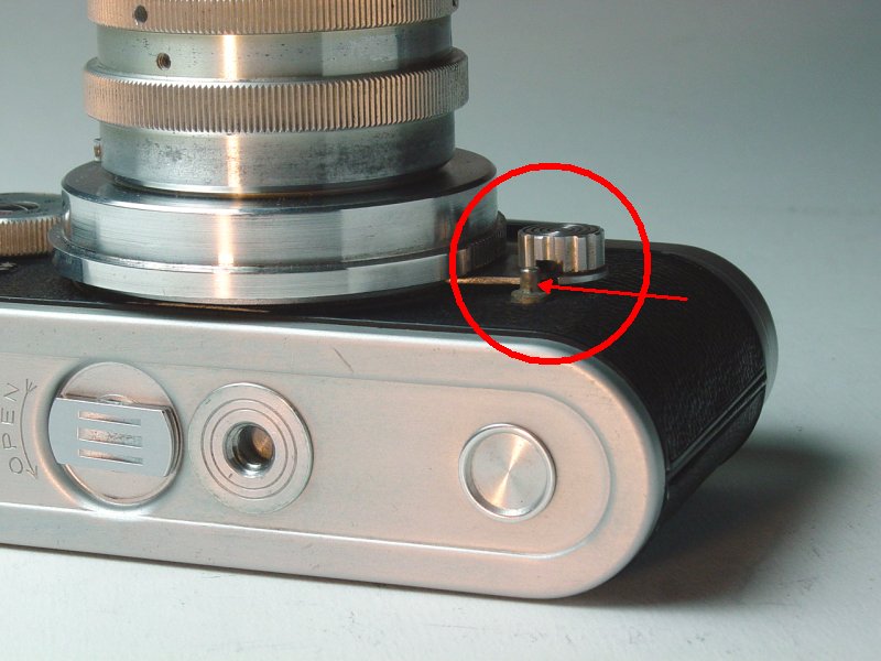 Removing Lenses - Release arm unlocked and disengaged from pin
