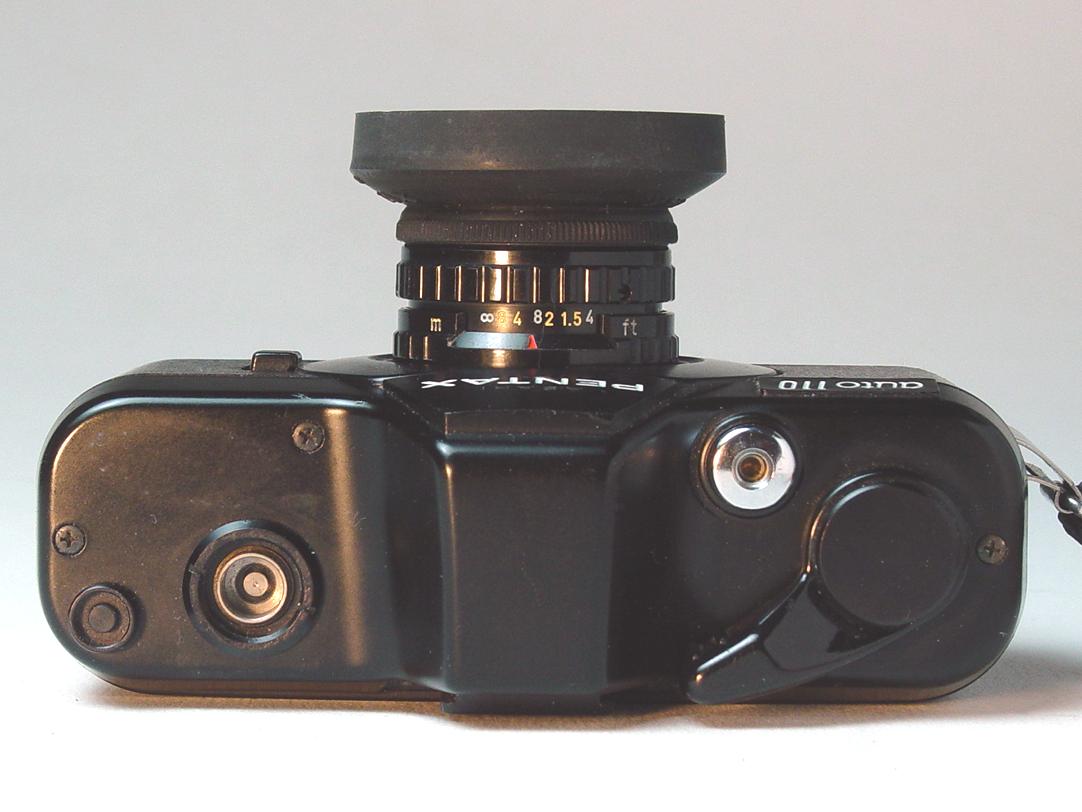 Pentax Auto 110 with Pentax-110 1:2.8 24mm and hood - Click to Enlarge