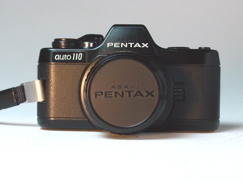 Asahi Pentax Auto 110 with Asahi Pentax-110 1:2.8 50mm and cap - Click to Enlarge