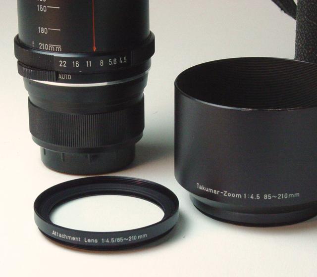 Super-Multi-Coated TAKUMAR-ZOOM 1:4.5/85~210mm Accessory Lens and Hood - Click to Enlarge